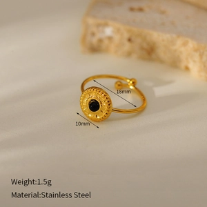 Detailed view of gold stainless steel ring featuring dimensions and a black stone inlay