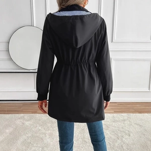 Back view of a black hooded windbreaker featuring a drawstring waist and striped lining
