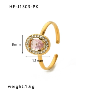 Detail view of gold adjustable ring with pink oval stone and white zircon halo setting