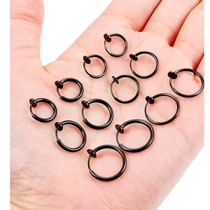 Punk style non-pierced spring clip earrings in dark red stainless steel on palm
