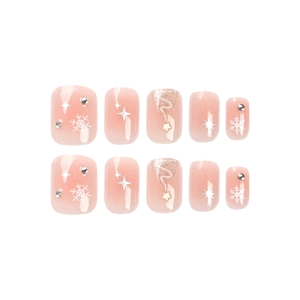 Short square pink gradient press-on nails with white snowflakes and star motifs