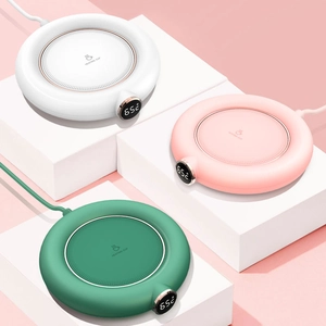 Smart USB cup warmer set in white, pink, and green with LED temperature display