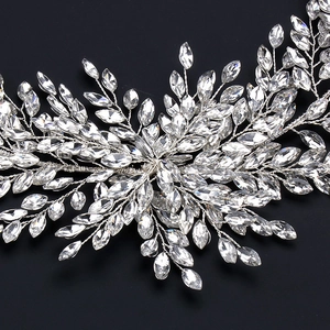 Elegant bridal hair band with silver wire and sparkling crystal leaf rhinestones on black back