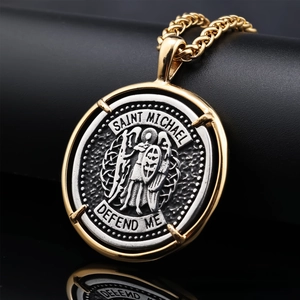 Macro view of Saint Michael medallion pendant with gold border and silver relief detail