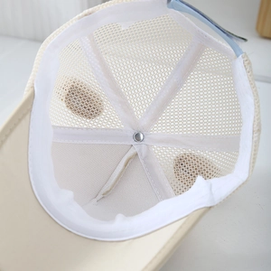 Internal view of a kids mesh baseball cap featuring breathable stitching and sweatband