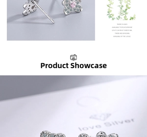 Detail of S925 sterling silver heart earrings with pink gemstone and clear S925 stamp