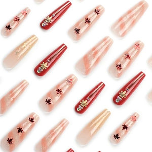 Long coffin red maple leaf press-on nails with gold sequins and rhinestones decor