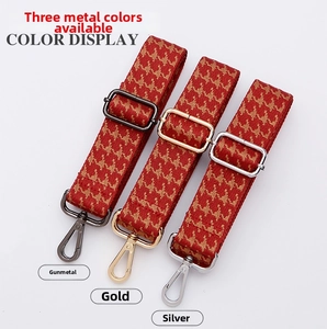 Adjustable wide houndstooth bag strap showing gunmetal, gold, and silver metal hooks