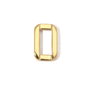 Close-up of golden rectangular stainless steel buckle with polished mirror finish