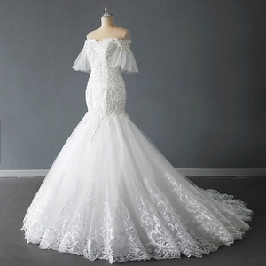 Off-shoulder mermaid wedding dress with sequins, pearls, and a long lace lace train