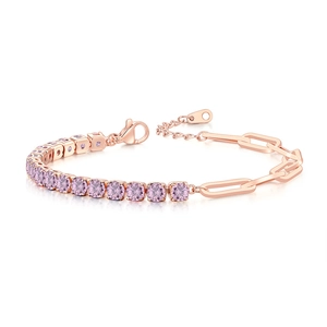 Detail of rose gold paperclip tennis bracelet with pink round-cut cubic zirconia gems
