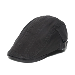 Detail view of dark gray cotton canvas hat with reinforced seams and metal side buckle
