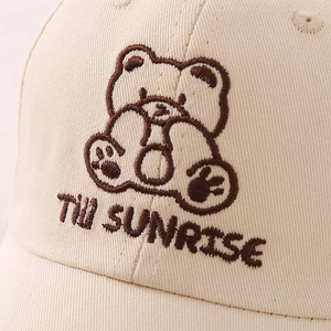 Kids beige cotton baseball cap with embroidered cartoon bear and Till Sunrise text