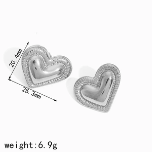 Polished silver heart stud earrings with vertical striped edges, 20.4mm by 25.3mm