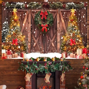 Christmas photography backdrop with snowy barn door, festive wreaths and lit trees