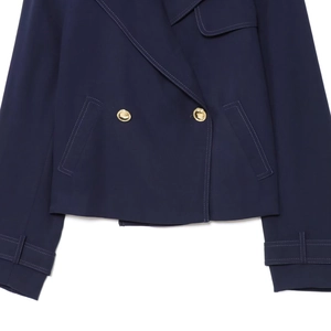 Women's navy blue double-breasted cropped jacket with gold buttons and contrast stitching