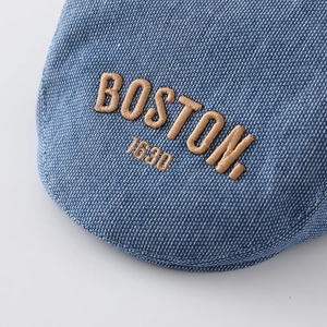Blue denim washed baby Boston beret with yellow embroidery for spring sun protection