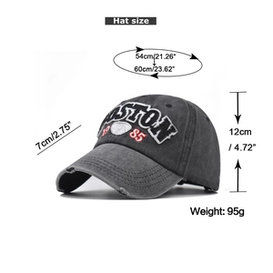 Detailed view of the Boston embroidery and distressed brim on a vintage baseball cap