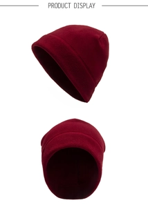 Detail view of burgundy fleece beanie showing reinforced stitching and thermal texture