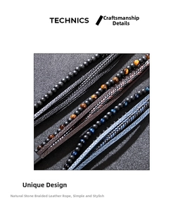 Detail of multi-layer men's bracelet with braided leather, tiger eye stones and matte beads