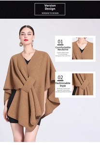 Detail of camel poncho jacket featuring V-neckline and waist buckle fastener detail