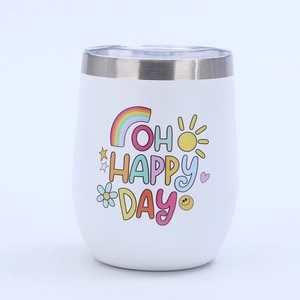 Detail of 12oz white egg-shaped tumbler with Oh Happy Day print and clear lid