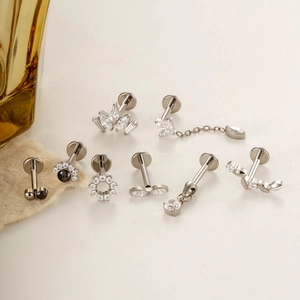 Polished G23 titanium stud earrings with sparkling zircon geometric shapes and charms