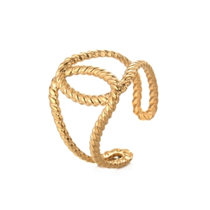 Irregular twisted gold open ring with minimalist geometric texture in studio lighting