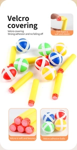 Detail of yellow EVA foam darts and multi-colored velcro target balls for kids target games