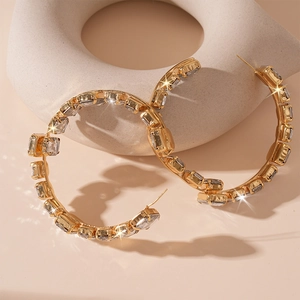 Exaggerated geometric golden hoop earrings with square zircon pavé in luxury vintage style