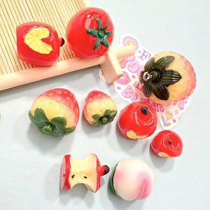 Cute 3D resin fruit charms featuring strawberries and apples for DIY phone cases