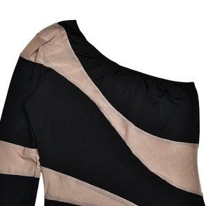 Detailed view of black and mesh sheer stripes on a one-shoulder elastic bodysuit