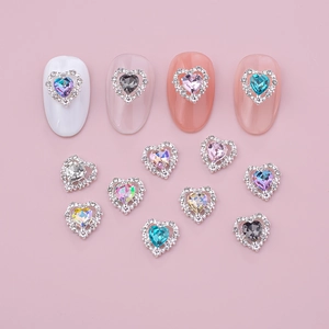 Luxury heart-shaped crystal nail charms set in silver alloy with colorful rhinestone borders