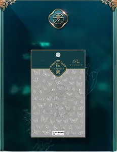 Détail macro de stickers ongles 3D TS-254 avec motifs papillons blancs et relief subtil