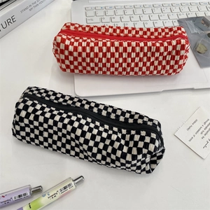 Checkerboard pattern velvet pencil case with zip closure in red and black colors