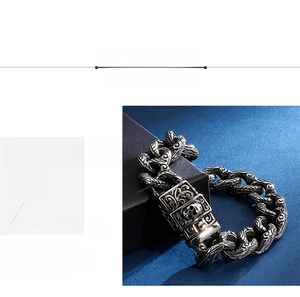 Detail of retro 316L stainless steel men's bracelet with skull clasp and cloud engraving