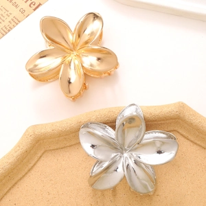 Elegant gold and silver frangipani flower metal hair claws with glossy mirror finish