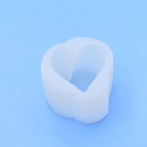 Translucent heart-shaped silicone mold with layered texture for DIY candle making
