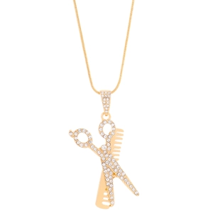 Golden scissor and comb pendant necklace with rhinestones on a sleek snake chain
