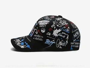 Side view of black streetwear baseball cap with colorful graffiti print and slogans