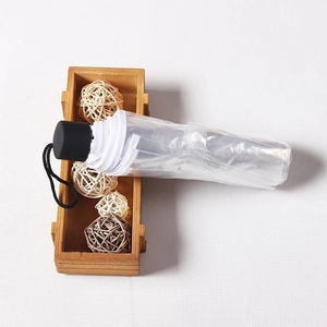 Three-fold transparent folding umbrella featuring a white border and black frosted handle