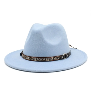 Detail of light blue felt fedora featuring an ethnic woven band and metal buckle