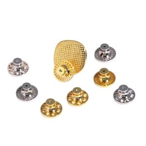 Set of 8 gold and silver earring lifter backs for support and drop prevention on white background