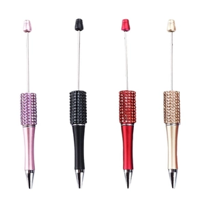 DIY beaded ballpoint pens with rhinestones in pink, black, red, and gold colors