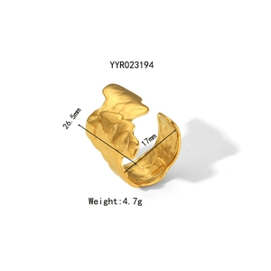 Gold plated stainless steel open ring with irregular hammered texture and wide band