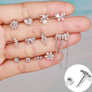 Pendientes helix de acero con mariposa de circonita y serpiente con detalles de medida