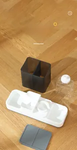 Exploded view of a modular automatic pet feeder with detachable base and water bottle