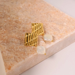 Minimalist gold wrinkled square metal earrings with white baroque pearls on stone