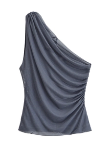 Detail of gray one-shoulder mesh top featuring asymmetric ruching and sheer texture