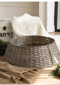 Detail of hand-woven grey-brown wicker Christmas tree collar with dense textures